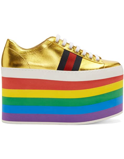 Gucci: Gold Peggy Platform Sneakers 